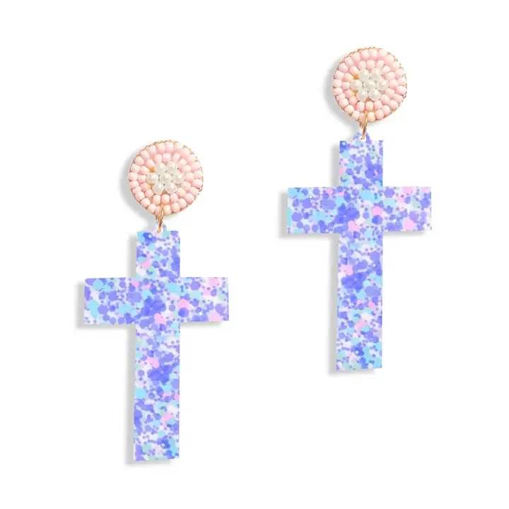Lilac Confetti Cross Earrings - The Lilac Confetti Cross Earrings are a must-have for any spring look. • 2" L • Lilac Confetti Acrylic Design • Beaded Post Back • Designed and Assembled in the USA