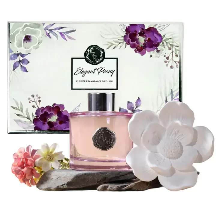 Magnolia Flower Diffuser Gift Set - Elegant Peony - Deliciated blooms of sweet Magnolia flowers comes in a beautiful lilac and silver decorated bottle. Reminiscent of your favorite summer floral blends of Peonies, Roses, and Patchouli will fill your room with this sweet aroma.