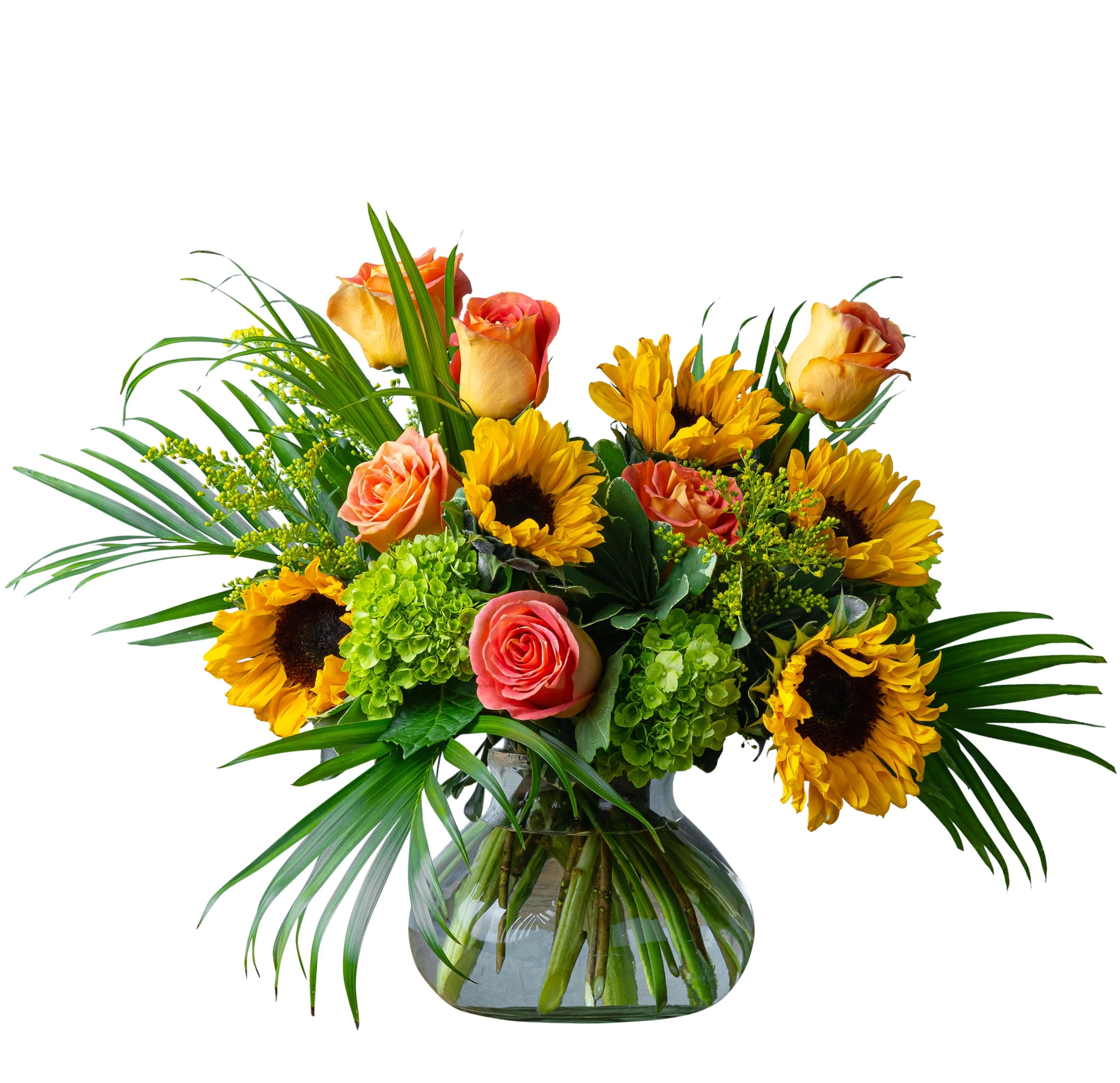 Bouquet of sunflowers and peach roses in a glass vase