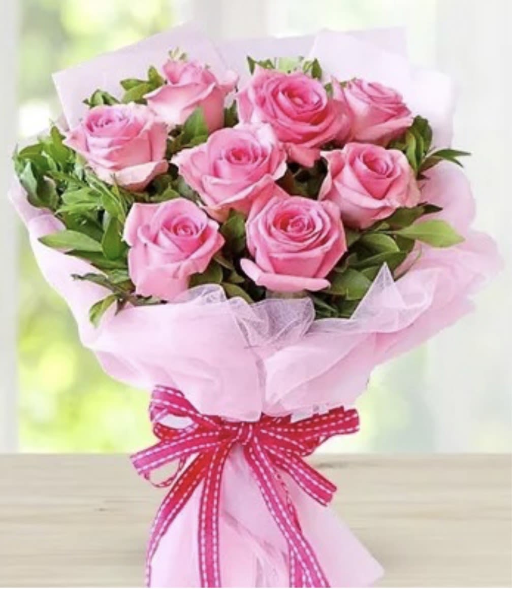 Dozen Pink Bouquet - Dozen pink roses in a beautiful bouquet with greens and pink Korean paper.