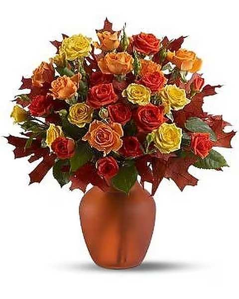 Amber Roses - Natural amber comes in every shade of gold – and this striking bouquet of fresh spray roses in autumn's favorite hues of gold and orange, accented with a few oak leaves, is perfectly precious! A lovely pick-me-up for a crisp fall day. 