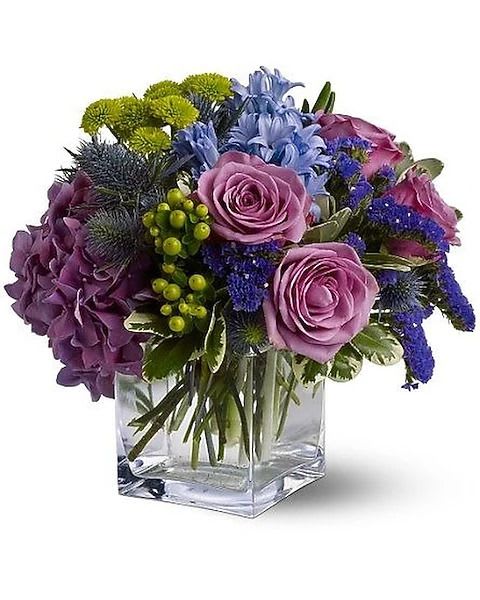 Best of Times - Celebrate the best of times with this glorious bouquet of misty blue and lavender blossoms, accented with a touch of chartreuse, and someone will remember you always. This fine flower arrangement is an excellent choice for a woman and can also be sent to a man.