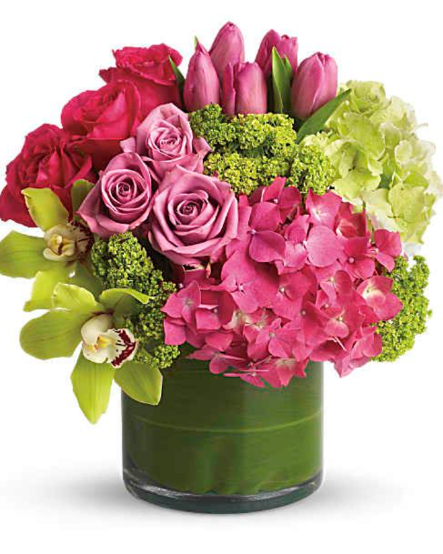 New Sensations - (ONE-SIDED) floral bouquet, perfect for spring time! it includes tulips, orchids and more.
