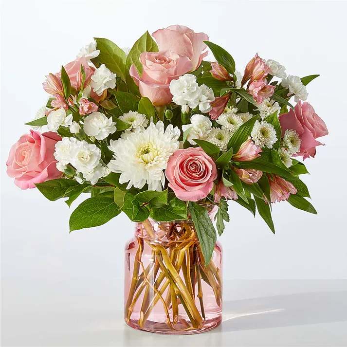 Infatuated Bouquet - Your recipient will be falling for these blushing alstroemeria and white mums, a beautiful way to share a Valentine wish, birthday delight, or gentle remembrance.  - Designed by florists, ready to display. - For long–lasting blooms, replace the water daily. We suggest trimming the stems every couple days. - Pet Safety Precautions: This bouquet or plant may include flowers and foliage that are known to be toxic to pets. To keep them safe, be sure to keep this arrangement out of your pet's reach.