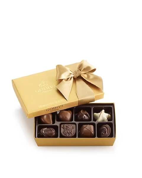 Godiva® Gold Ballotin Assorted Chocolates - The Godiva® Gold Ballotin contains Godiva's® Signature assortment of classic Belgian chocolates. Each piece is an exquisitely rich, velvety chocolate with fascinating flavors and intriguing textures to delight your favorite chocolate lover. Arriving in a beautiful golden box, this gift creates the perfect impression of style and sophistication.