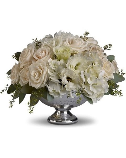 Park Avenue Elegance - Treat your guests to Park Avenue Elegance with this dazzling arrangement of crème roses, white hydrangea and white lisianthus presented in a brilliant silver bowl. It's a lovely choice for any special occasion, from weddings to anniversaries. A beautiful silver bowl presents a soft mix of crème roses, white hydrangea and white lisianthus accented with seeded eucalyptus.