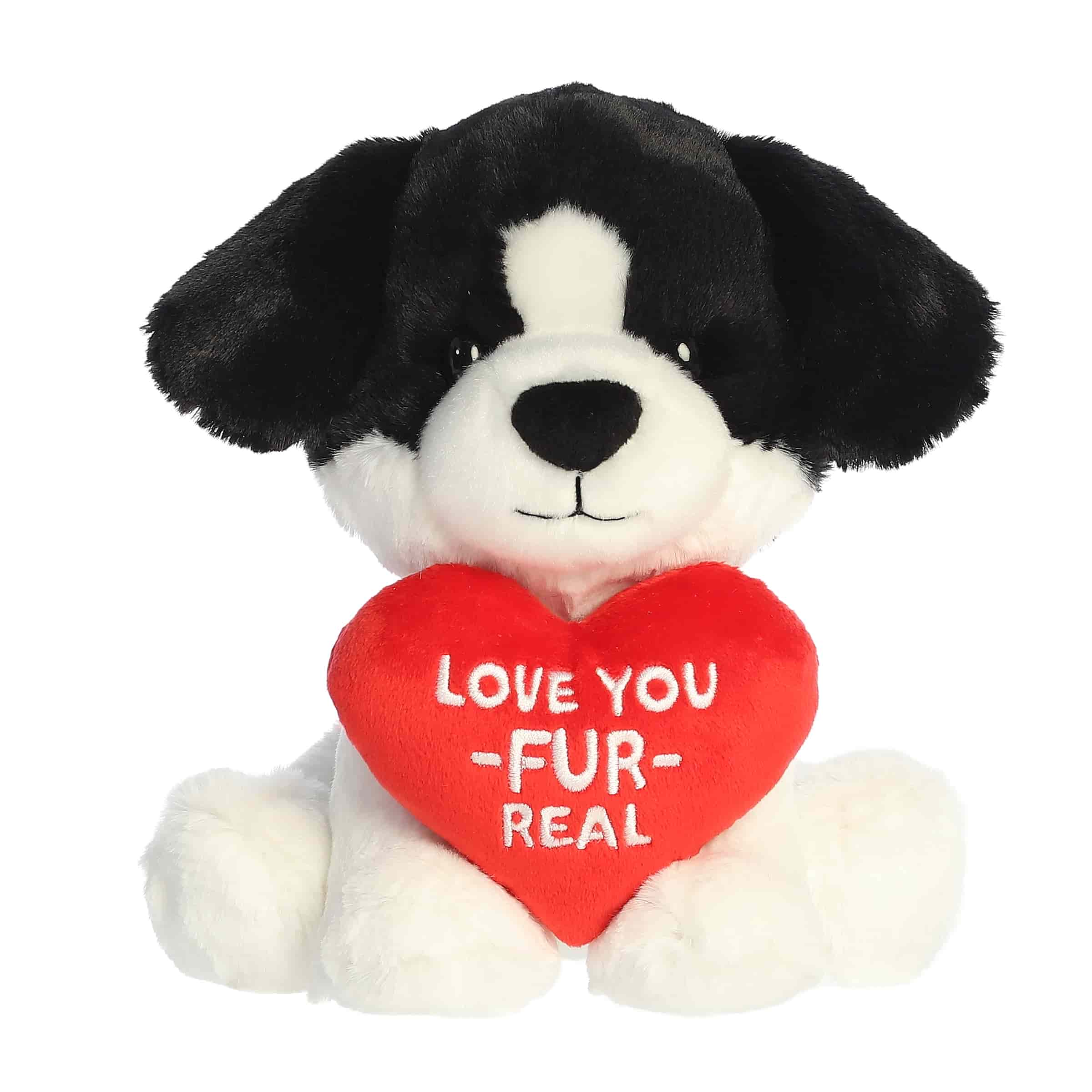 Plush- "Love you Fur Real" - A soft black and white puppy plush holding a red heart that says, "Love You Fur Real." A cute and cuddly gift perfect for showing love. 