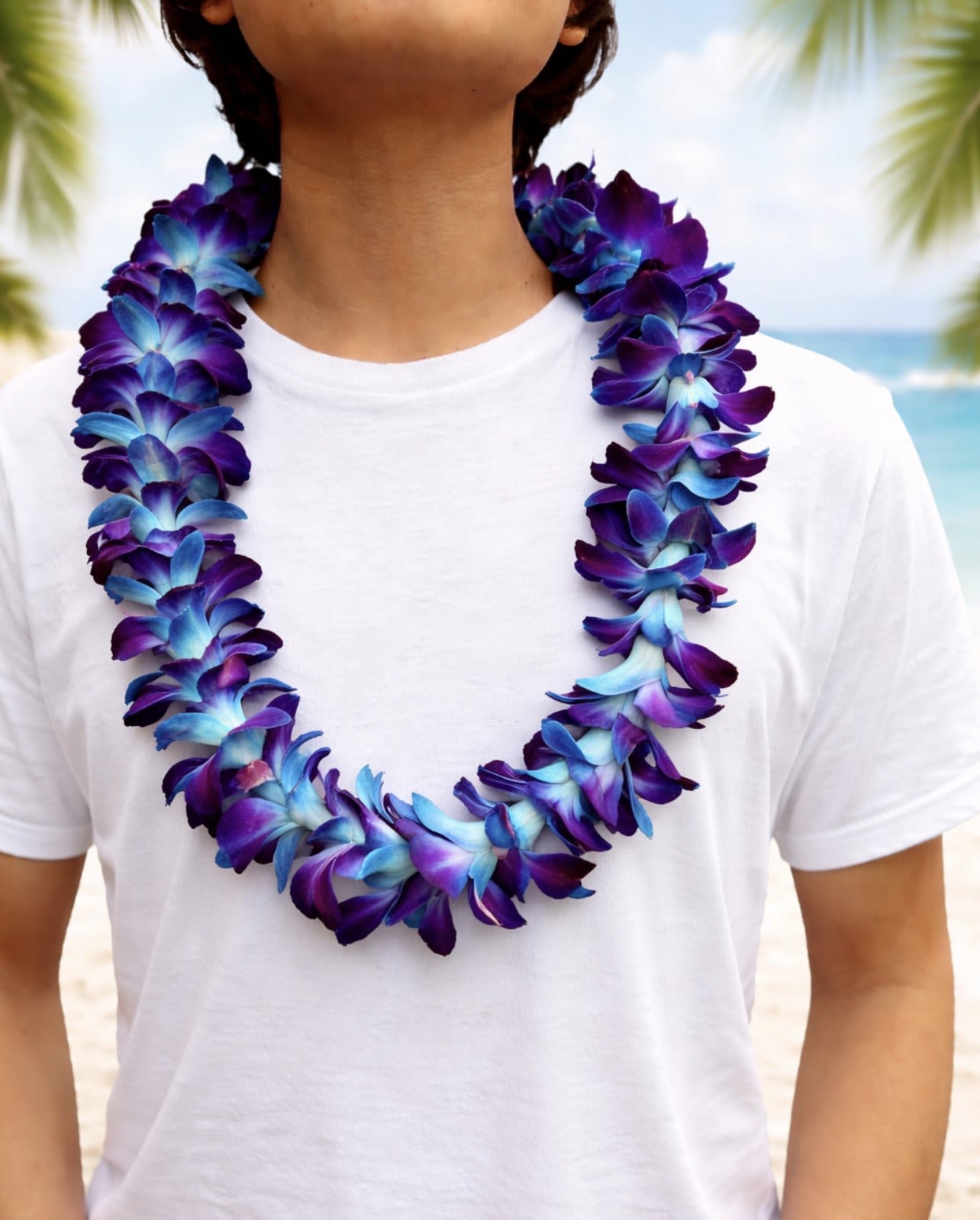 Midnight Lagoon Orchid Lei - A bold and elegant orchid lei designed to celebrate Columbia University graduates. Featuring rich shades of Columbia blue blended with deep violet tones, this lei brings a modern, tropical twist to a timeless milestone. Lightweight and eye-catching, it’s the perfect statement piece for graduation day—honoring achievement with style, color, and a memorable island-inspired touch.