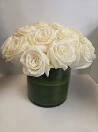 ROSES ALL DAY - Roses!  Beautifully arranged in a classic vase make for an elegant diplay of joy. This arrangement can be made in any color you like.  Just let us know. 