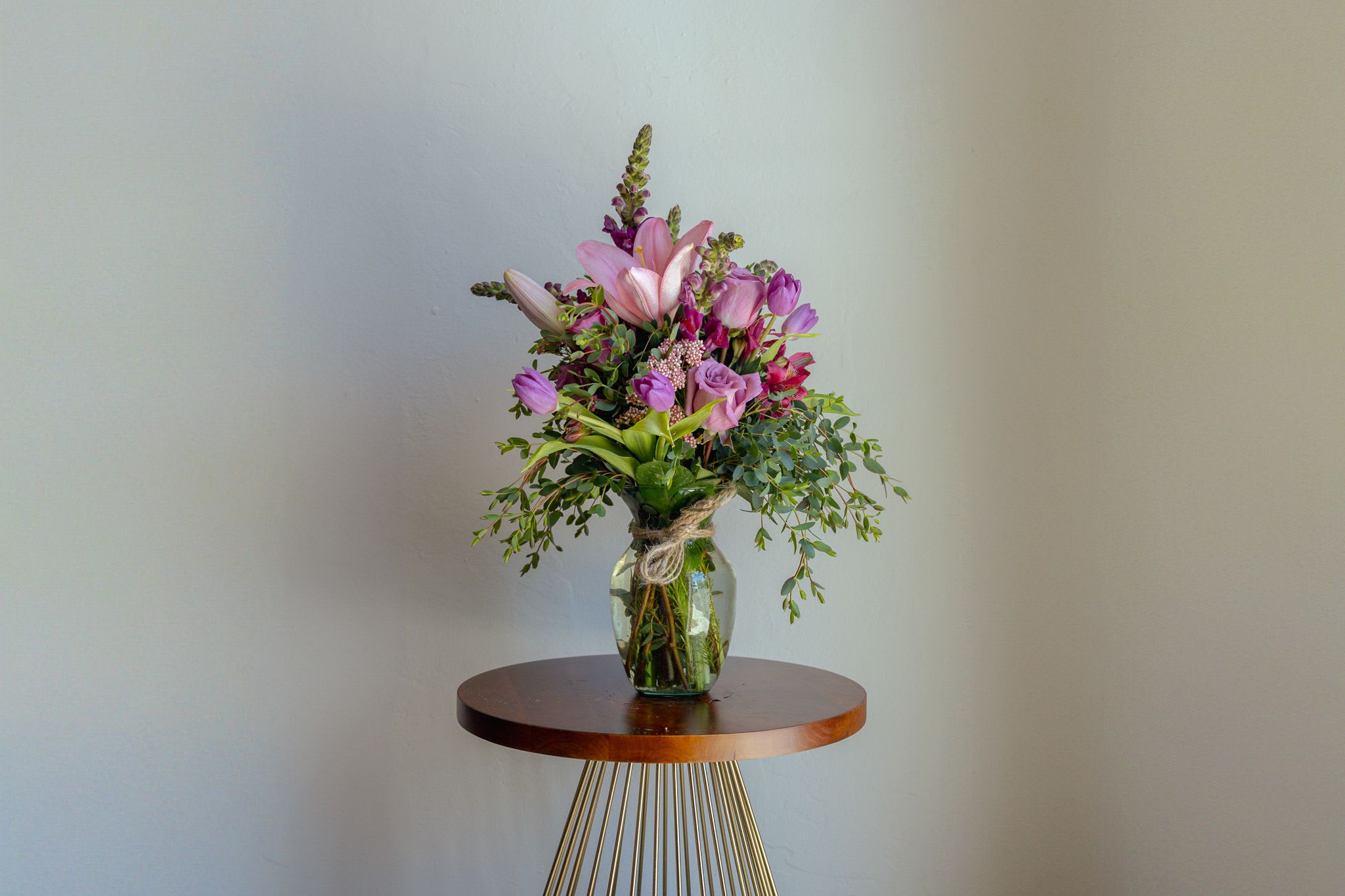 Pastel Color Palette - Petite Everyday Arrangement  - Mix of season flowers with lush florals which may include roses, spray roses, gerbera daisies, lilies and hydrangeas arranged in a vase. Pastel Color Palate