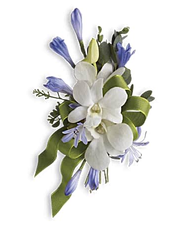 White orchid and light purple flower corsage with green ribbon accents