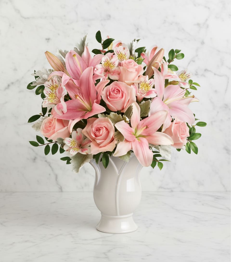 Soft And Tender Bouquet - Share your heartfelt feelings on the loss of someone special with this feminine arrangement of soft pink roses and lilies.