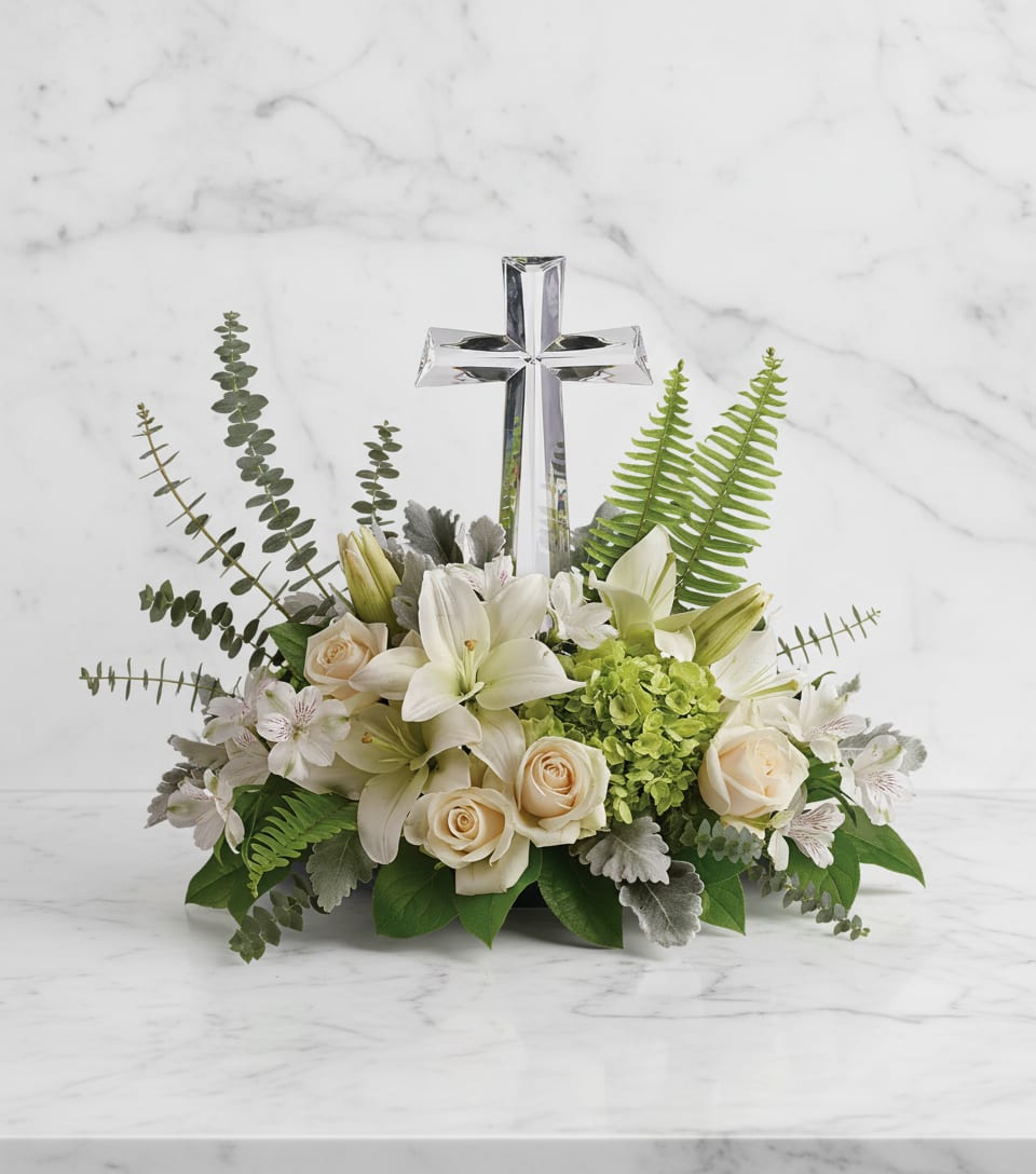 Life's Glory Bouquet - This peaceful bouquet of soft white flowers and green accents is a beautiful message of sympathy, adorned with a large crystal cross keepsake.