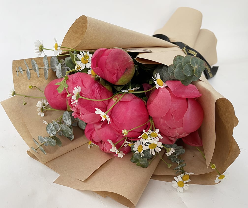 Peony Bouquet -  The standard size includes half dozen peonies. The deluxe size includes a dozen peonies and the premium size includes two dozen peonies. 