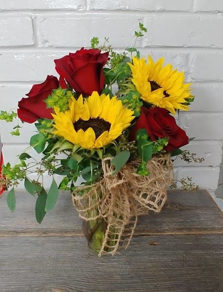 Sunshine Romance - Sunny sunflowers with gorgeous red roses sure to romance her!