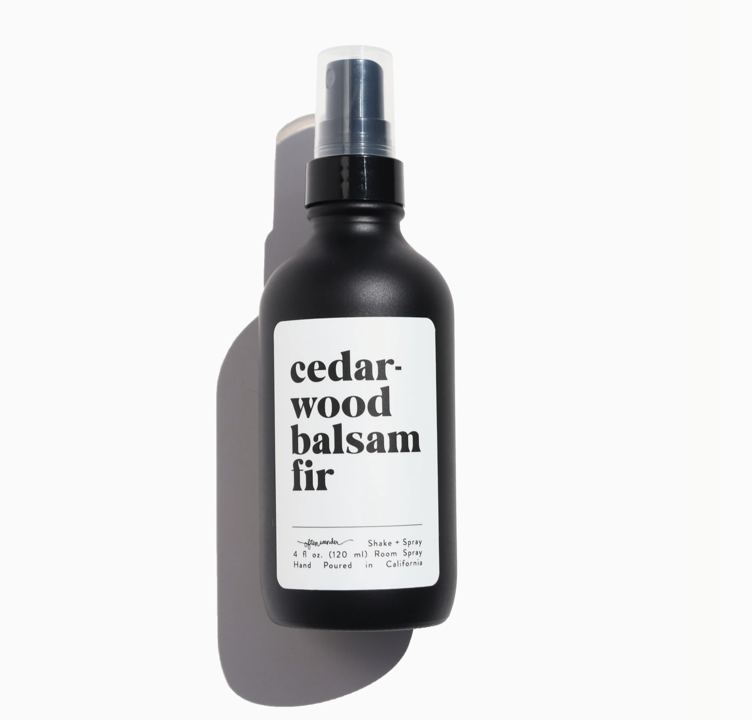 Black cedarwood balsam fir room spray bottle with white label