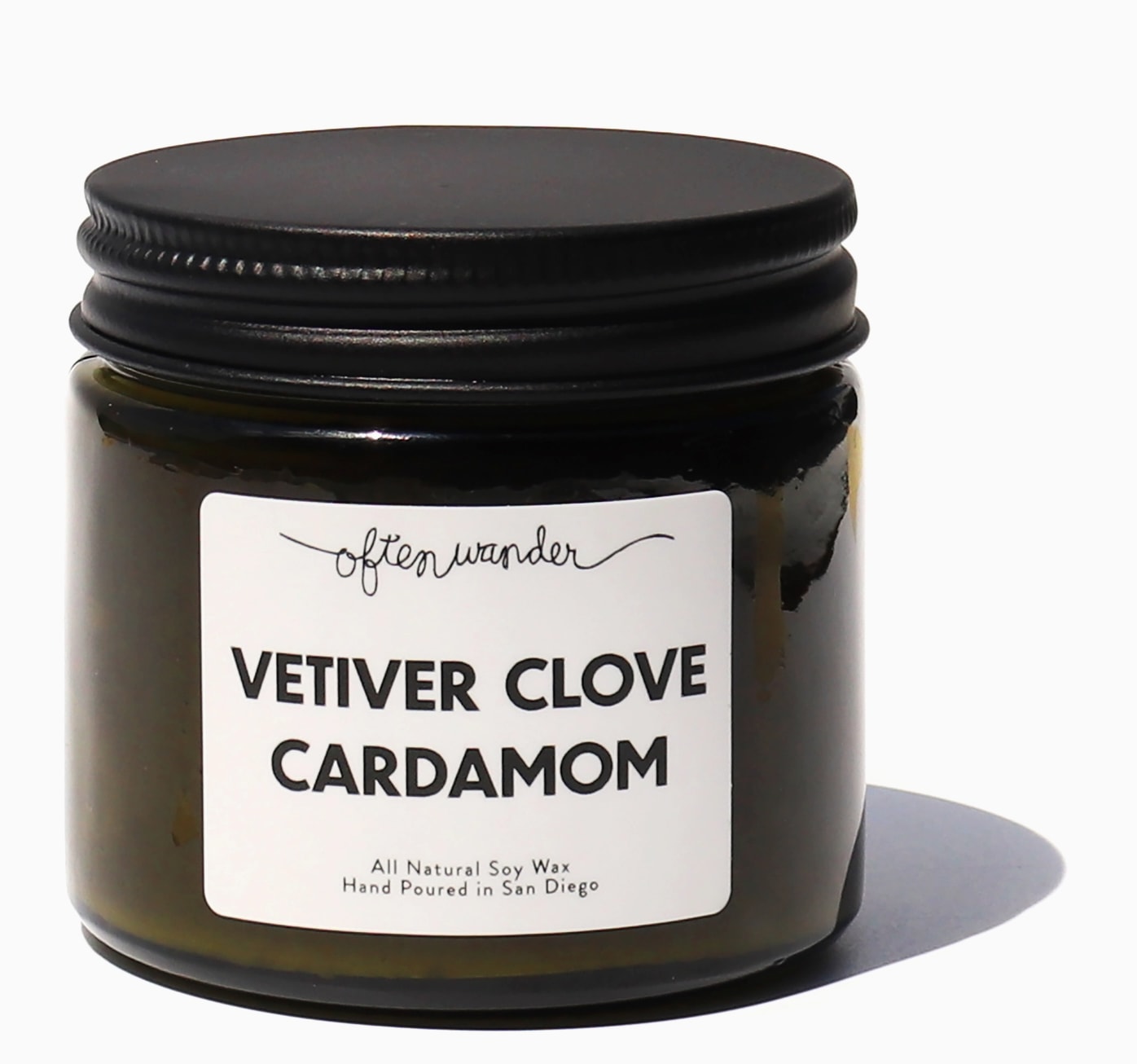 *SALE* Vetiver Clove Cardamom Candle - 6oz  - Vetiver Clove Cardamom takes on the strength and cleanliness of vetiver, and the sweetness and spice of clove.  The cardamom adds an earthy, aromatic, and masculine fragrance. Making this a scent that appeals to everyone. ________________________________________________________________  Often Wander candles are made with 100% natural soy wax, quality essential and fragrance oils, and a cotton wick.  Clean and slow burning, these 6 ounce smooth and creamy soy candles have 40 hour burn times.  Hand-poured in San Francisco, CA.