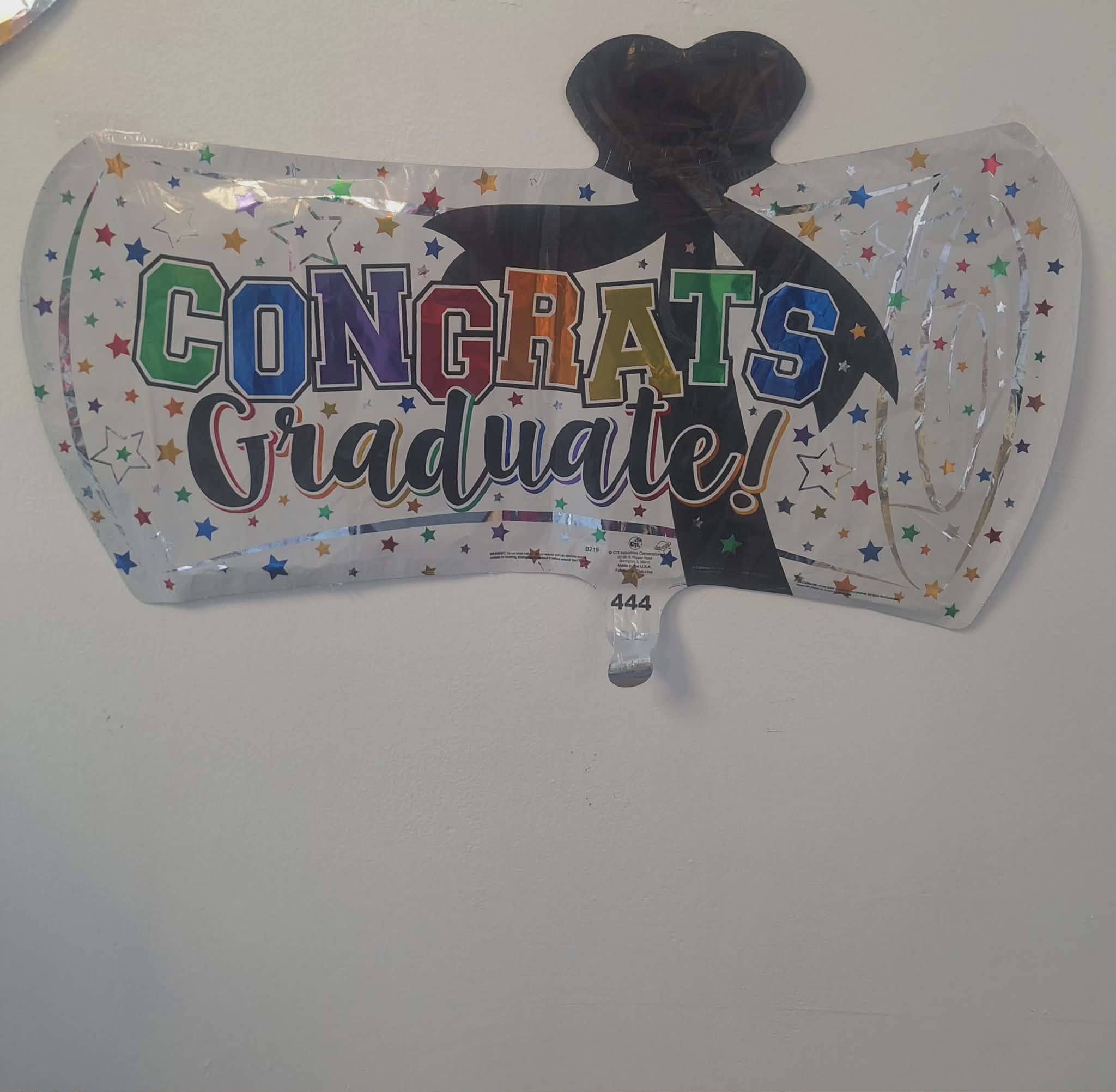 Graduation balloon with colorful "Congrats Graduate!" text