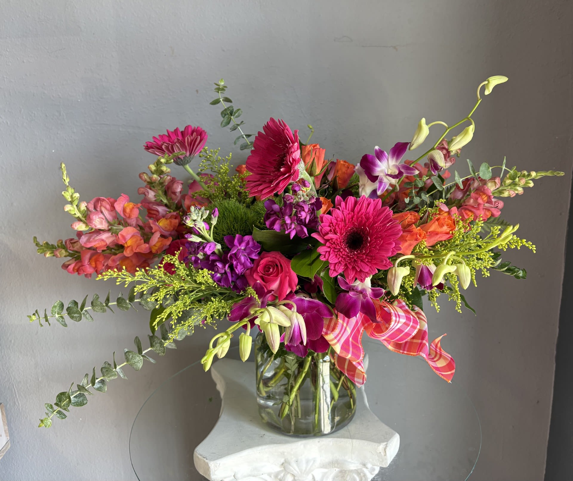 #736 Designer's Choice Vase Arrangement  - This beautiful flower arrangement of fresh mixed seasonal blooms is made by local designers in the heart of Orange California. Hand crafted and perfect for every occasion, from birthdays and new babies to sympathy and just because. The best choice to show you are thinking of that special someone. Can be sent as a local delivery or in-store pickup. This is an original, one of a kind arrangement. Order now before it's too late!  UPGRADES: All upgrades are applied at the designer’s discretion and fulfilled to value using the freshest seasonal and/or premium flowers available. Container upgrades may be included when possible; otherwise, value is reflected in the floral selection while maintaining the original design style. 