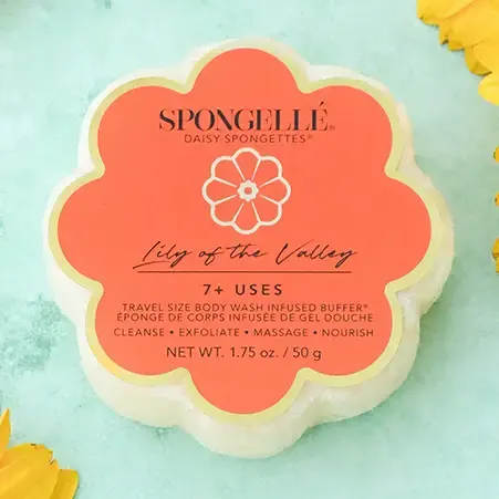 Lily of The Valley Spongette Soap Sponge - Our Lily of the Valley Spongette meets Daisy Collection’s signature flower design. Everything you love about our travel-friendly Spongette with the bonus of soft petal curves to enhance your cleansing experience. Stroll through a blooming garden where the gentle scent of lily of the valley, lush melon, and luminous amber create a secret haven of serene beauty. Plus, our Spongette is accepted on all airlines making Lily of the Valley your go-to for warm hideaways and memorable excursions abroad. Good for 7+ washes each.