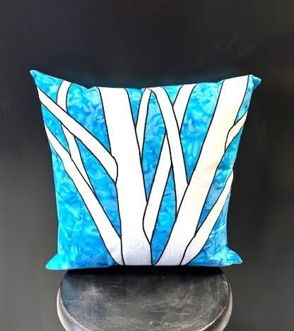 "Blue Sky Birches" Pillow - Bright blue marbled background and ribbon-like white stripes give this decorative pillow a modern, graphic energy-perfect as a contemporary accent for a living room, bedroom, or a casual anniversary gift. As a home décor piece, the "Blue Sky Birches" pillow reads like art you can touch; its bold blue, crisp white, and black-contrast palette makes it an immediate focal point that will make the person you're gifting feel seen and uplifted.  The square, plush pillow features a compact form that layers easily on a chair or sofa; the bright marbling adds visual texture while the high-contrast white bands create movement across the face. Use it alone to punctuate a neutral space or pair it with a chair and other soft textures for a curated gift set. Ideal for housewarmings, birthdays, or as a cheerful "thinking of you" surprise-order sizing and care details are available at checkout to ensure long-lasting color and shape.