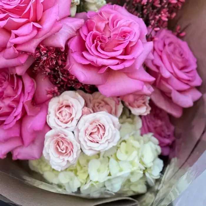 The Juliet - Hand-tied Bouquet (Deluxe Size Pictured) - Hand-Tied Bouquet | Pinks  Soft, romantic, and effortlessly graceful, The Juliet blends delicate shades of blush and pink with lush, garden-inspired textures. This bouquet feels tender and poetic—light, airy, and full of charm. Wrapped with care, it’s a gentle expression of affection, perfect for celebrating love in its most beautiful form.  Available in two sizes.  Product ID: the-juliet 