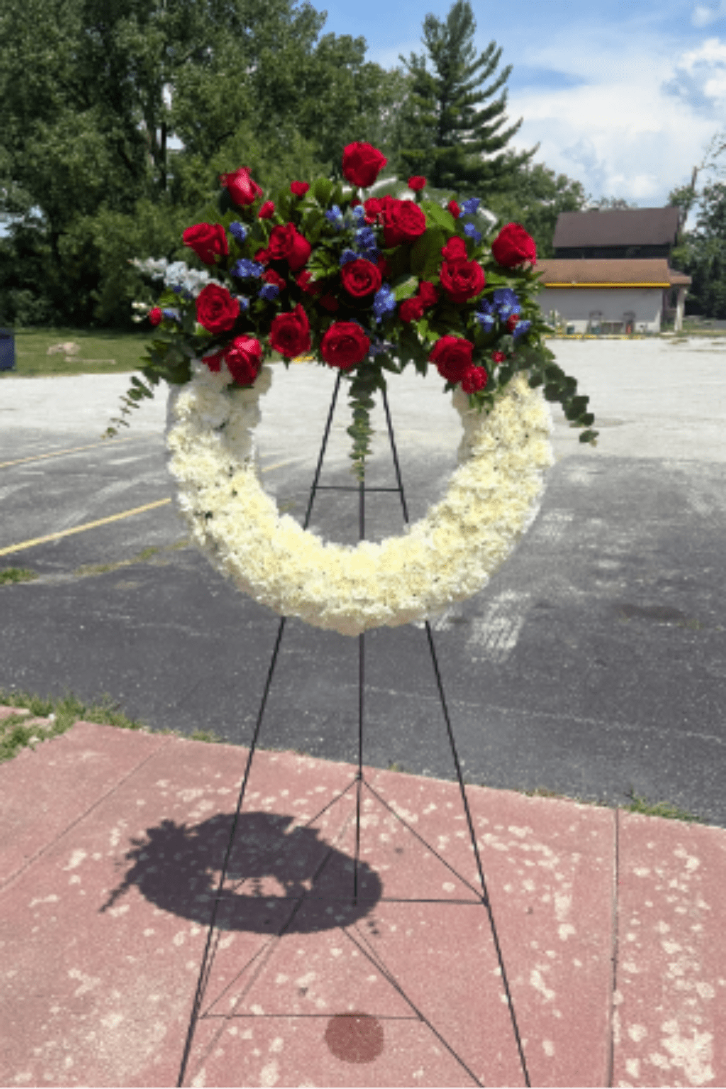 American Soul by Lulas - A perfect way to honor their beliefs and actions, this red, white, and blue wreath is a tribute to those who loved their country. 
