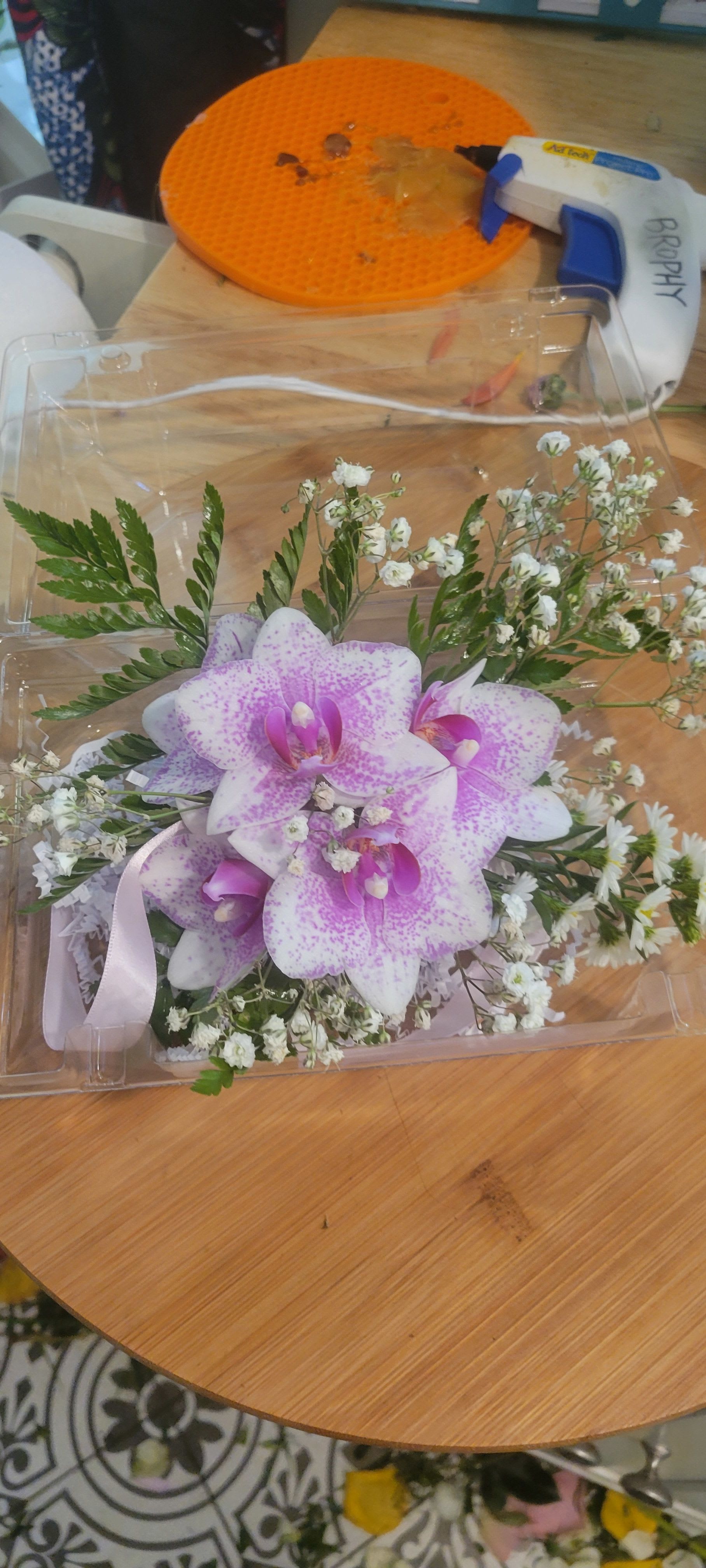 Love to Dance - Love to dance with this beautiful orchid corsage on your wrist.