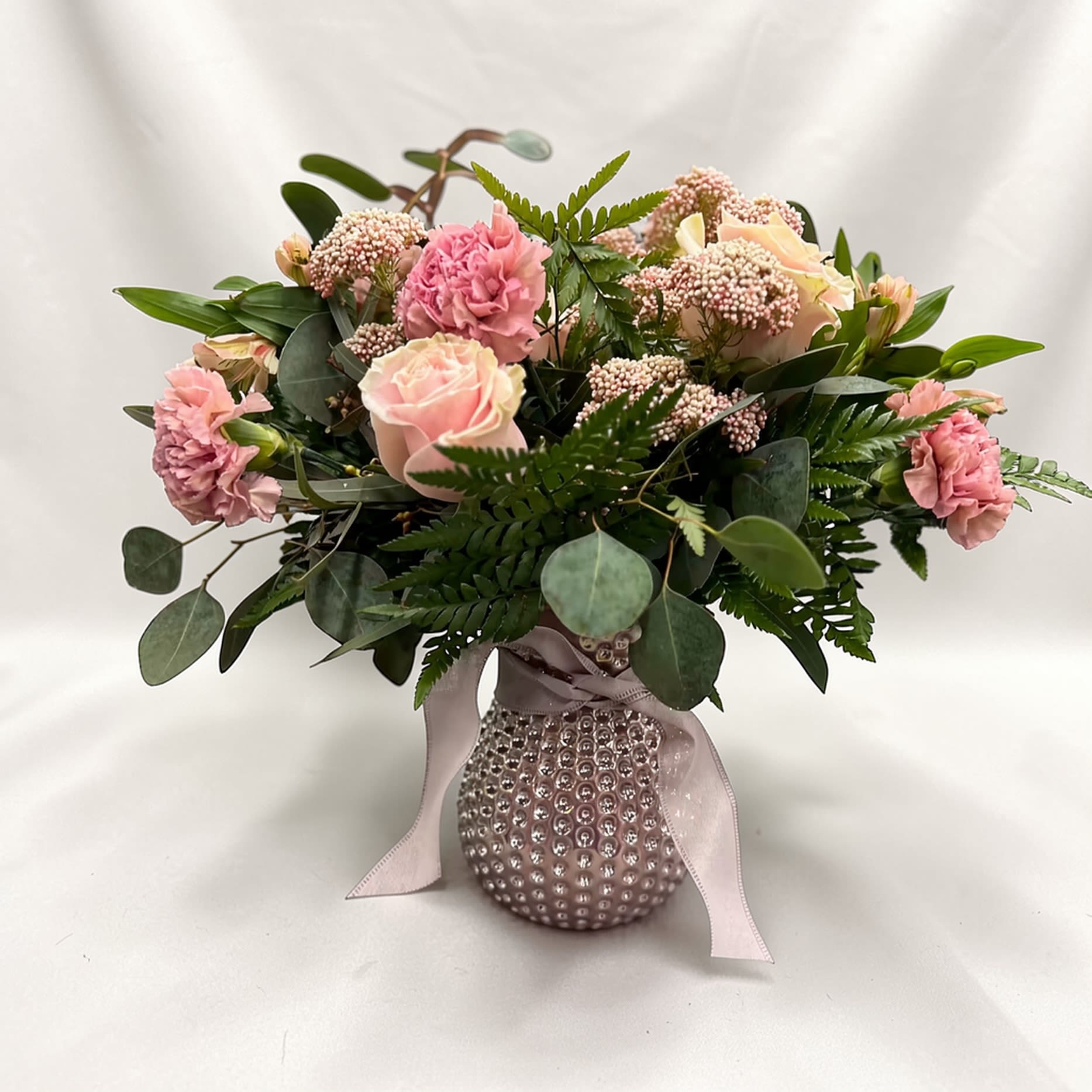 Pretty in pink - Beautiful mixed arrangements in colors of pink. Flowers may vary and have substitutions! 