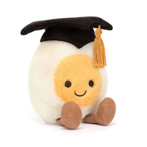 Plush egg-shaped toy wearing a graduation cap and tassel