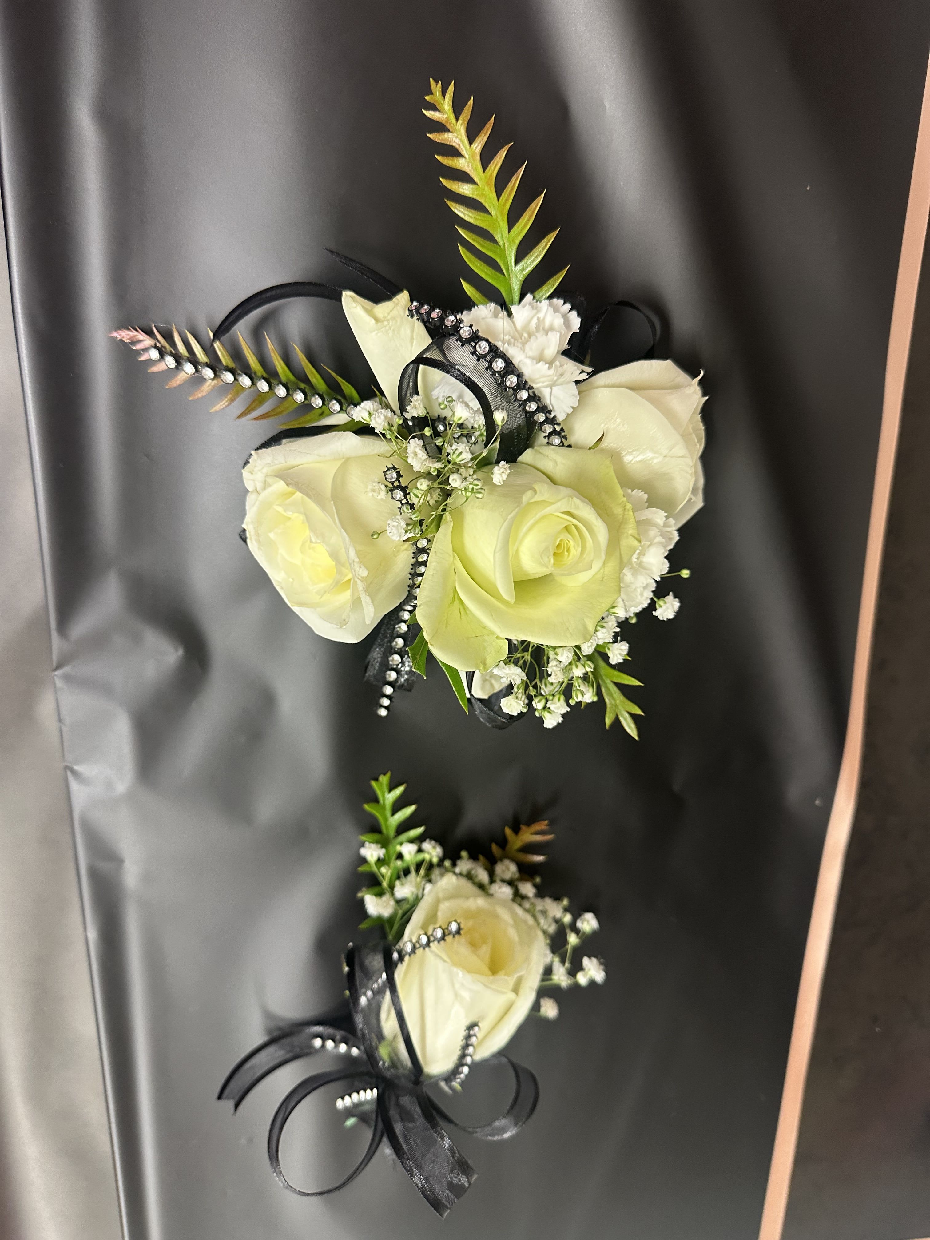 White corsage &amp; boutonnière  - White rose with black ribbons comes with boutonniere 