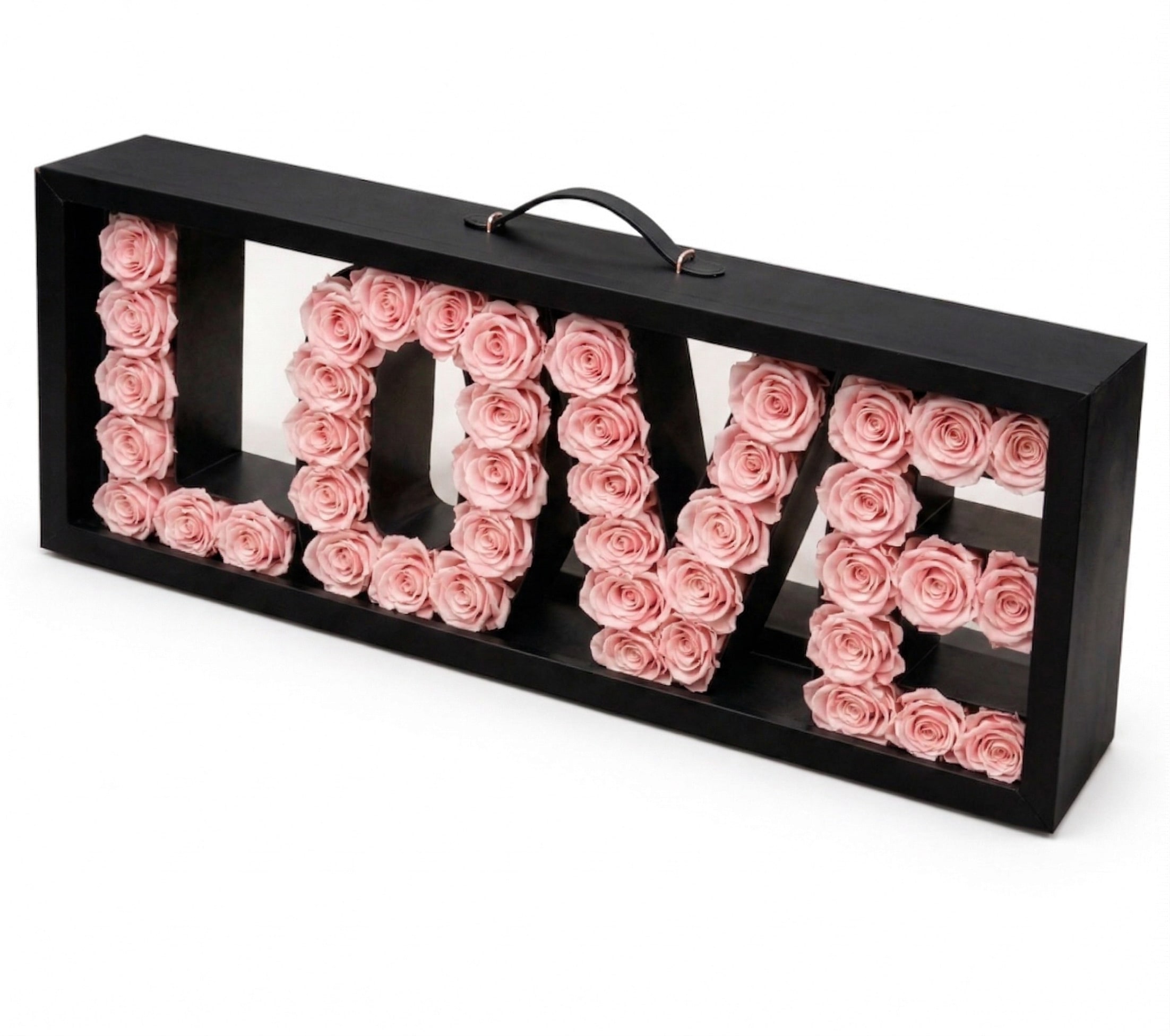 LOVE Pink - "LOVE" truly comes in full bloom! This stunning arrangement features pink roses, a symbol of your eternal devotion  Shop this breath-taking presentation, exclusively available at La Belle Fleurs