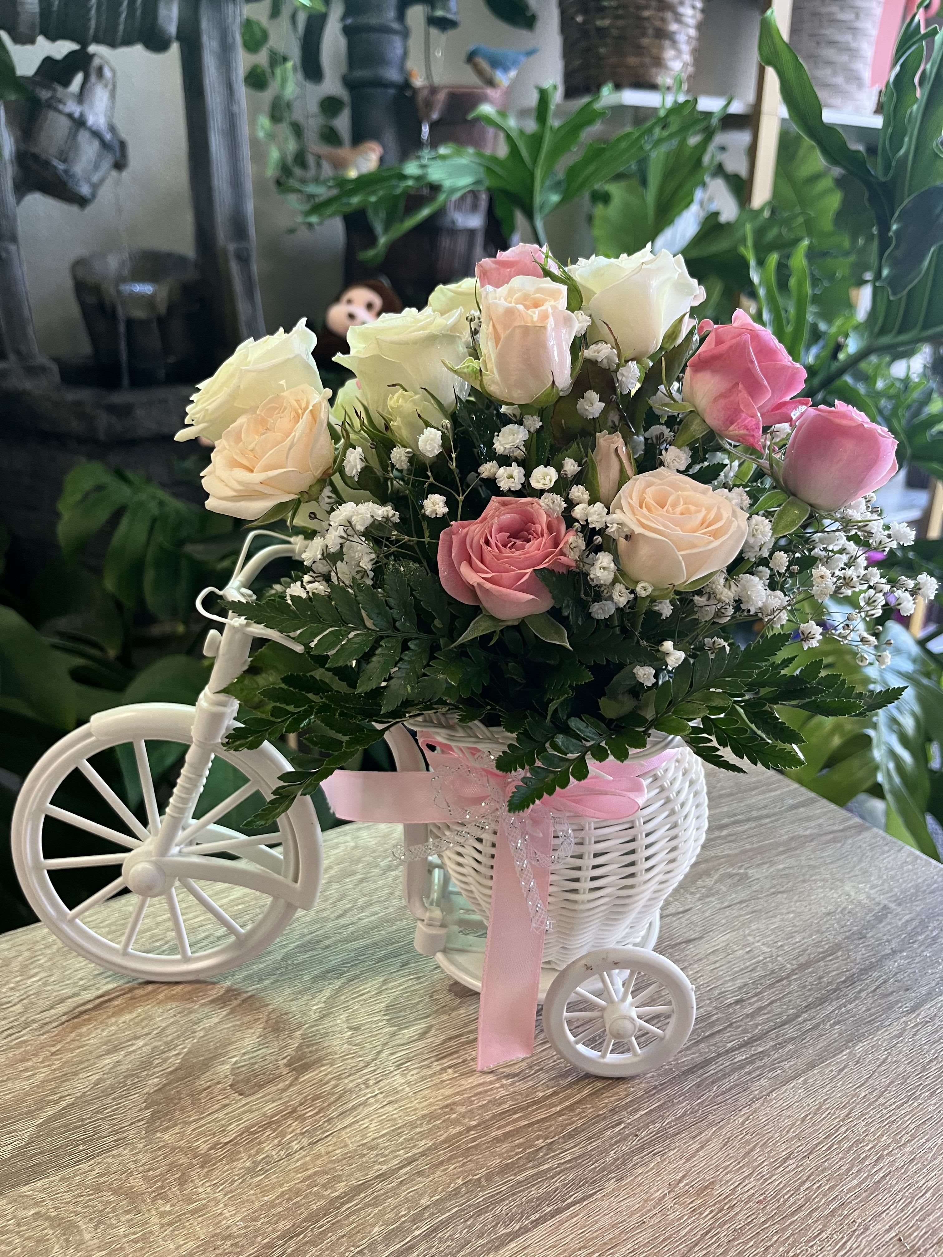 Bicycle  spray roses  - fresh spray roses decorated in bicycle 