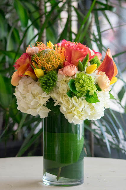 Colorful mixed bouquet in a clear glass vase