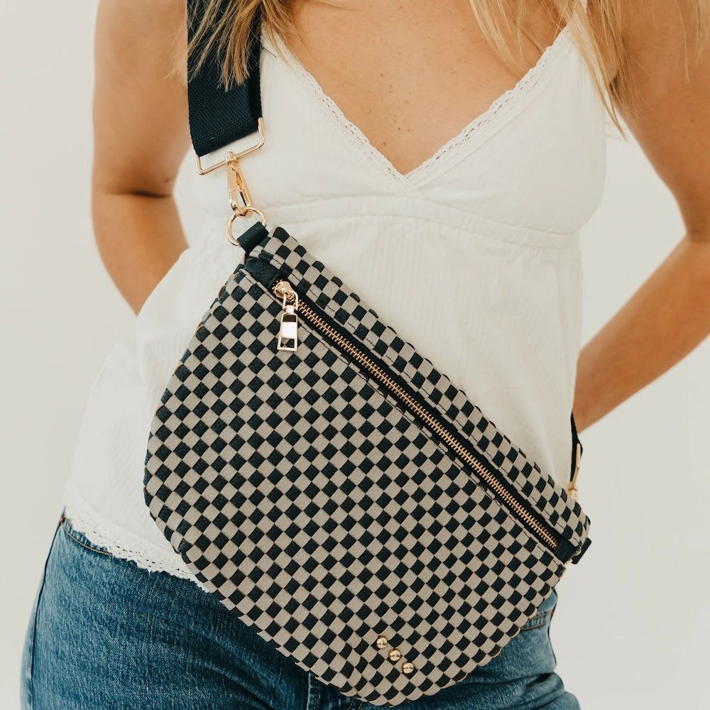 Navy/Grey Checkered Bum Bag - Meet the Westlyn Woven Bum Bag! Gorgeous woven vegan leather! Beautiful hardware with a zipper closure with beige and black chevron interior, and a zippered slash pocket on the inside. This crossbody bag is the perfect accessory to elevate any outfit! Available in 25 colors perfect for your everyday, date night, game day, travel and more!   Measurements: 12"L x 8"H x 24"-46" strap