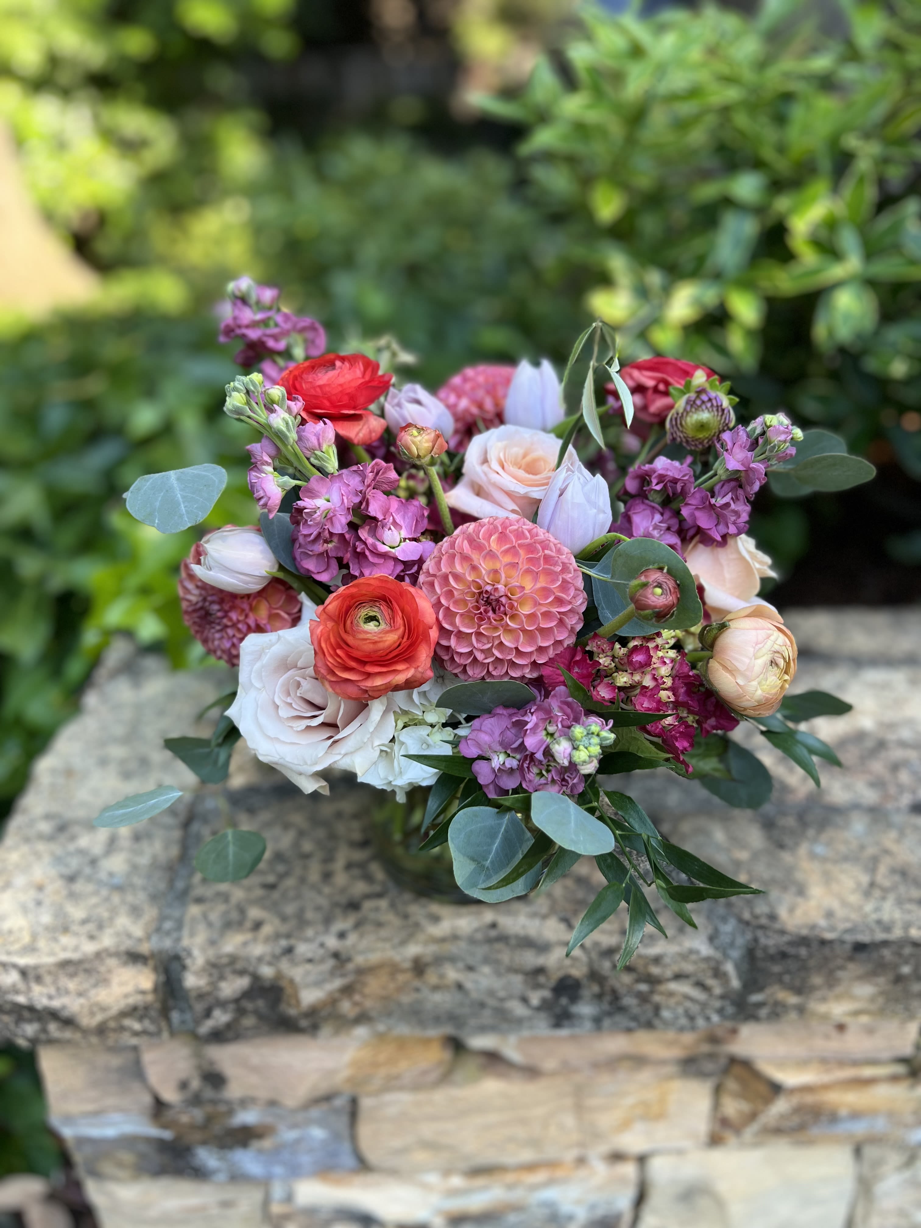 Forget Me Not  - Warm toned dahlias and lavender muted hues accented with pops of color make up this gorgeous design! 