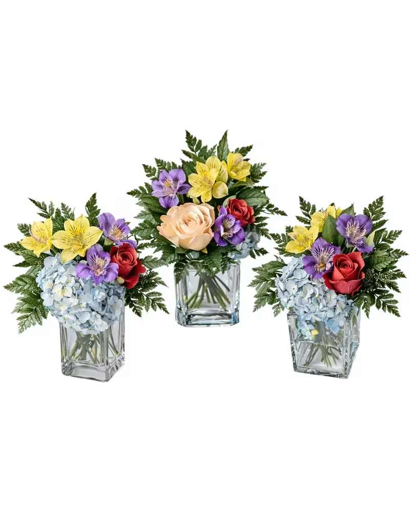 Springtime Party - Want to enjoy a springtime celebration? Our Springtime Party will create excitement around your table. Flowers like roses, and hydrangea and alstromeria are tastefully arranged in three cubes to stage together or separately upon request. 