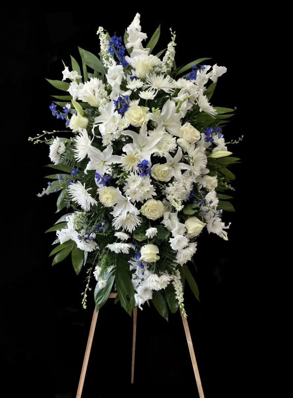 White and Blue Standing Spray - Blu and white standing spray with mixed flowers. 