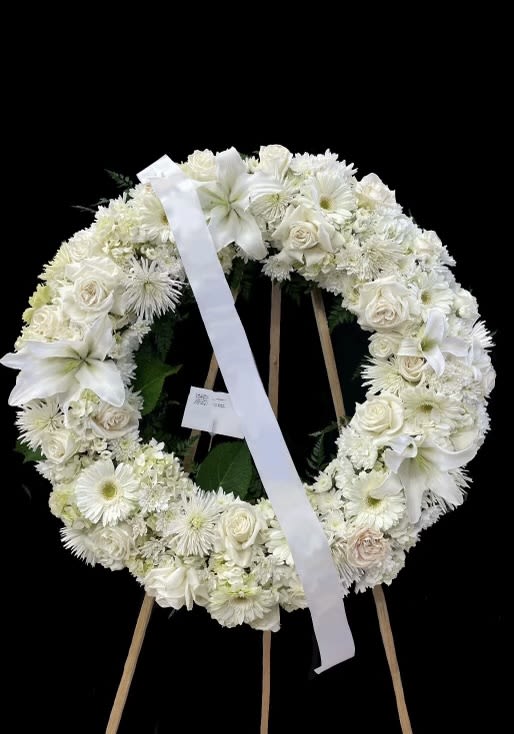 Sympathy Wreath - All white wreath with mixed flowers. 