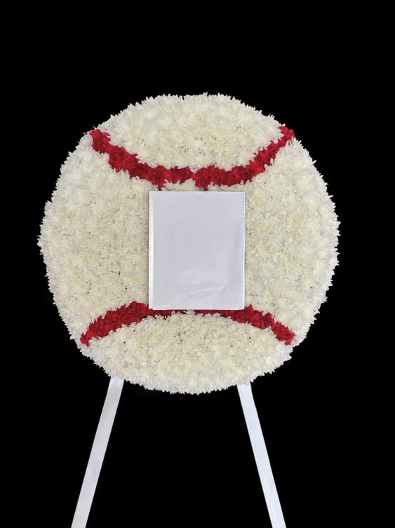 Floral Baseball  - White and red flowers shaped in a baseball shape. 