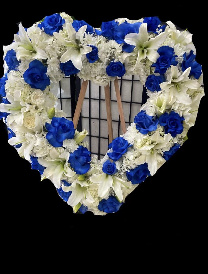Blue Heart - Blue roses and mixed white flowers.