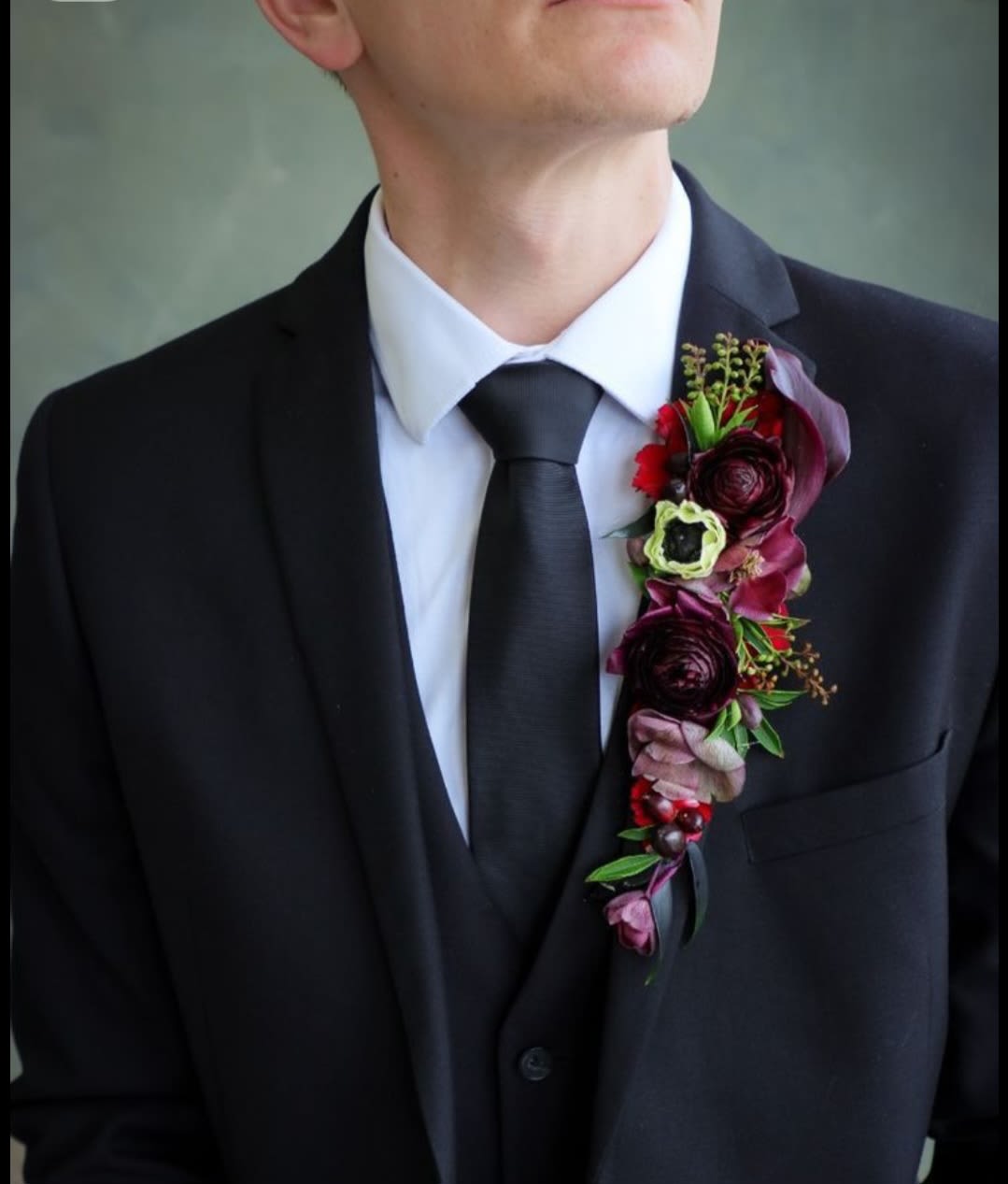 Lapel boutonniere tattoo (no ink involved) - Level up, stand out from the crowd with this piece of wearable floral art! This lapel boutonniere is made on athletic tape and adheres to your suit lapel, so cool! Please let me know your colors in the special instructions or call to order 719-557-2778 