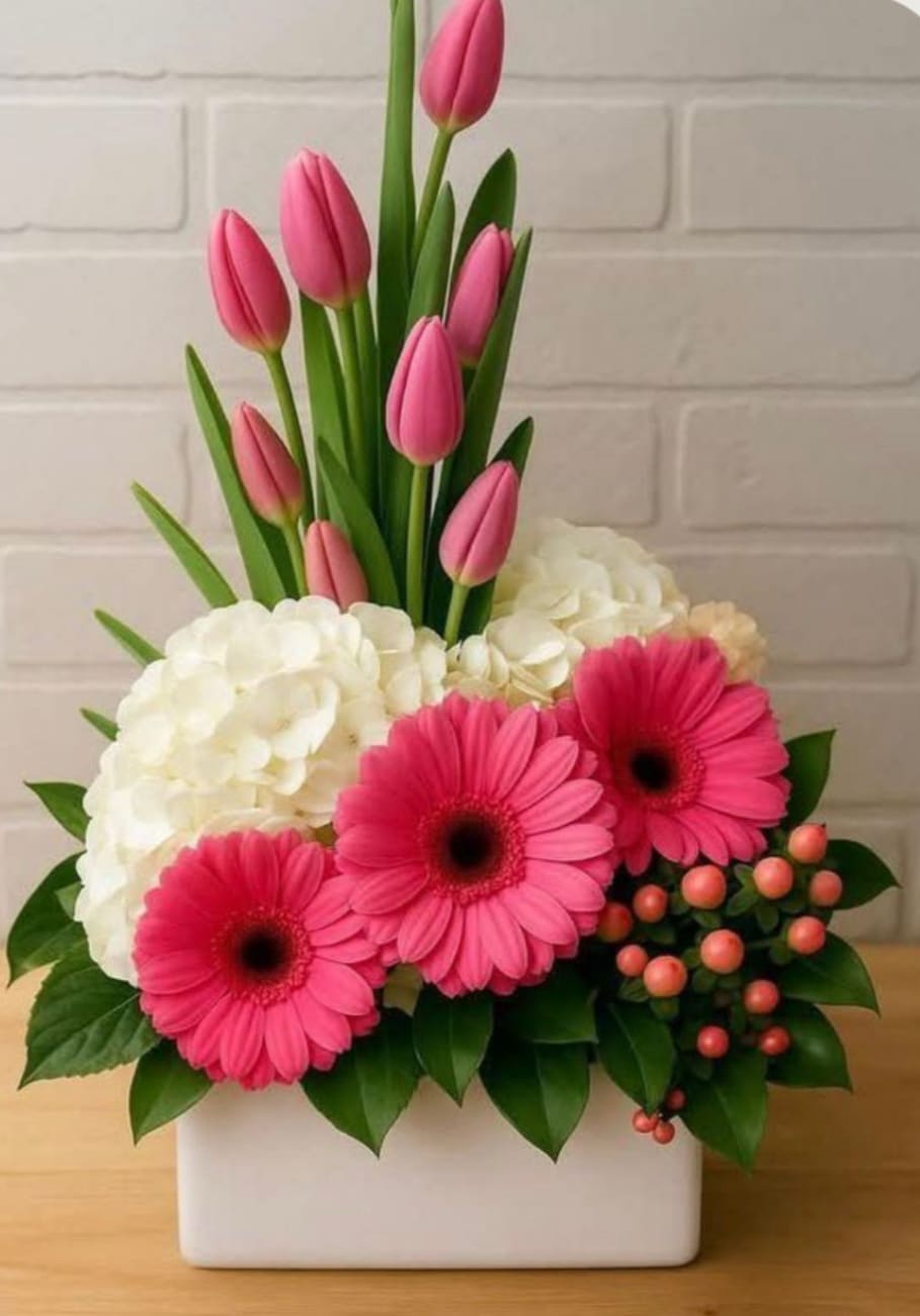 Pink Tulip and Gerbera elegance . Flower Delivery San Antonio - Beautiful mix of pink tulips, gerbera daisies and white hydrangeas in a modern design. By Snyder Flowers-San Antonio florist with same day delivery.