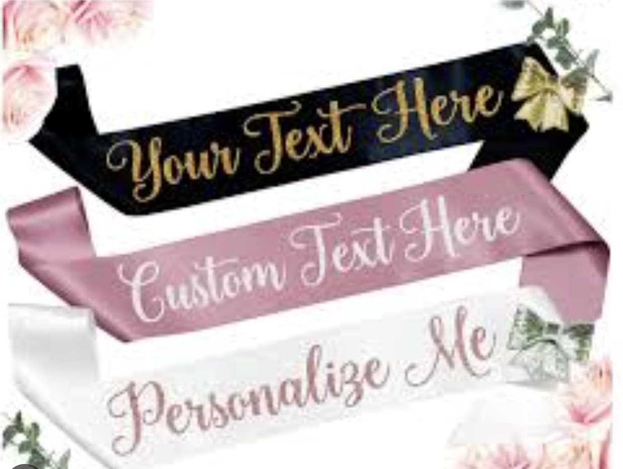 Decorative ribbon banners with customizable text and floral accents
