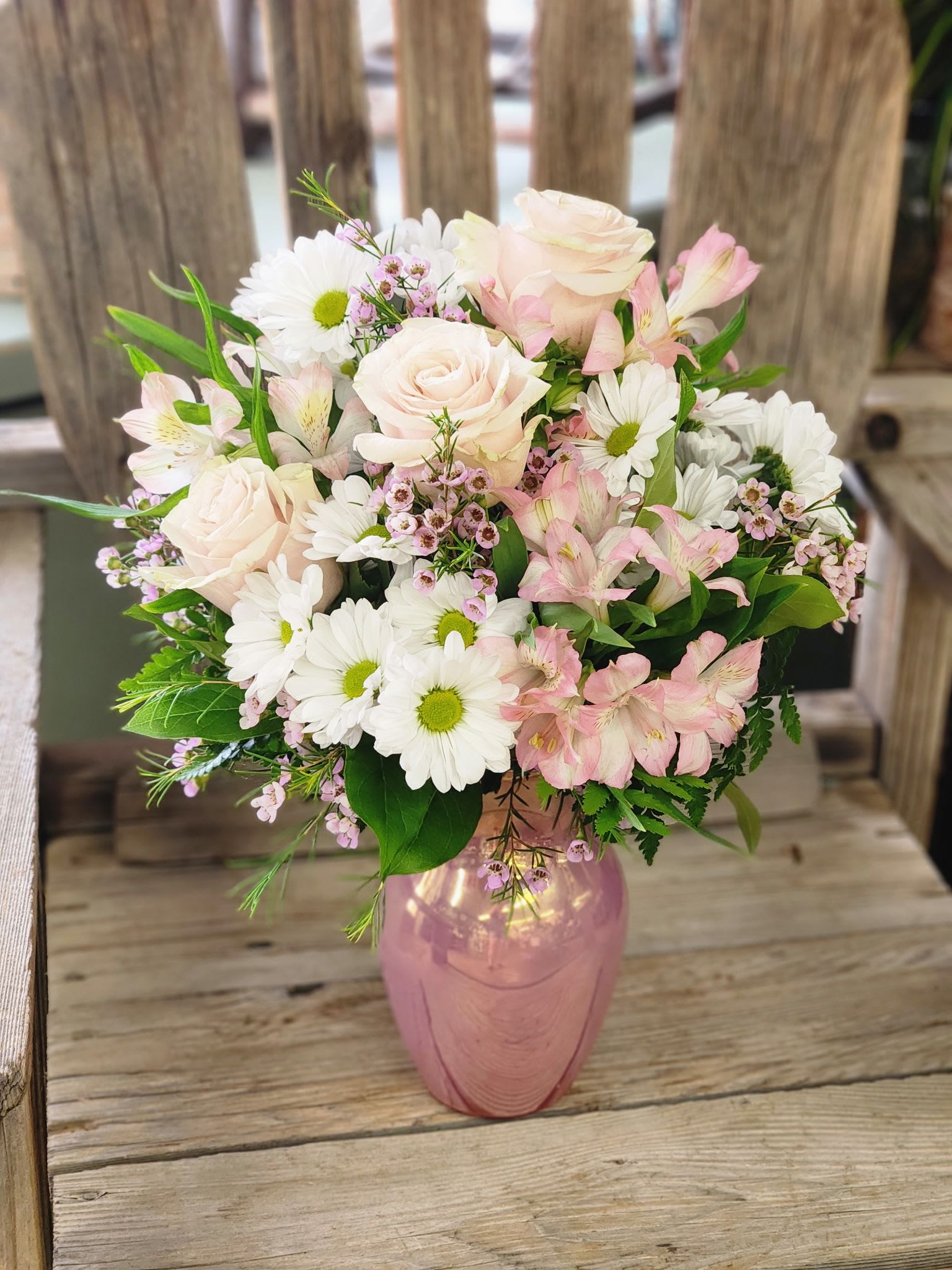 Pinky Promises - Our beautiful pink pearl vase is blooming in pink roses, white daisies and playful alstromeria! We pinky promise that they will love it! 