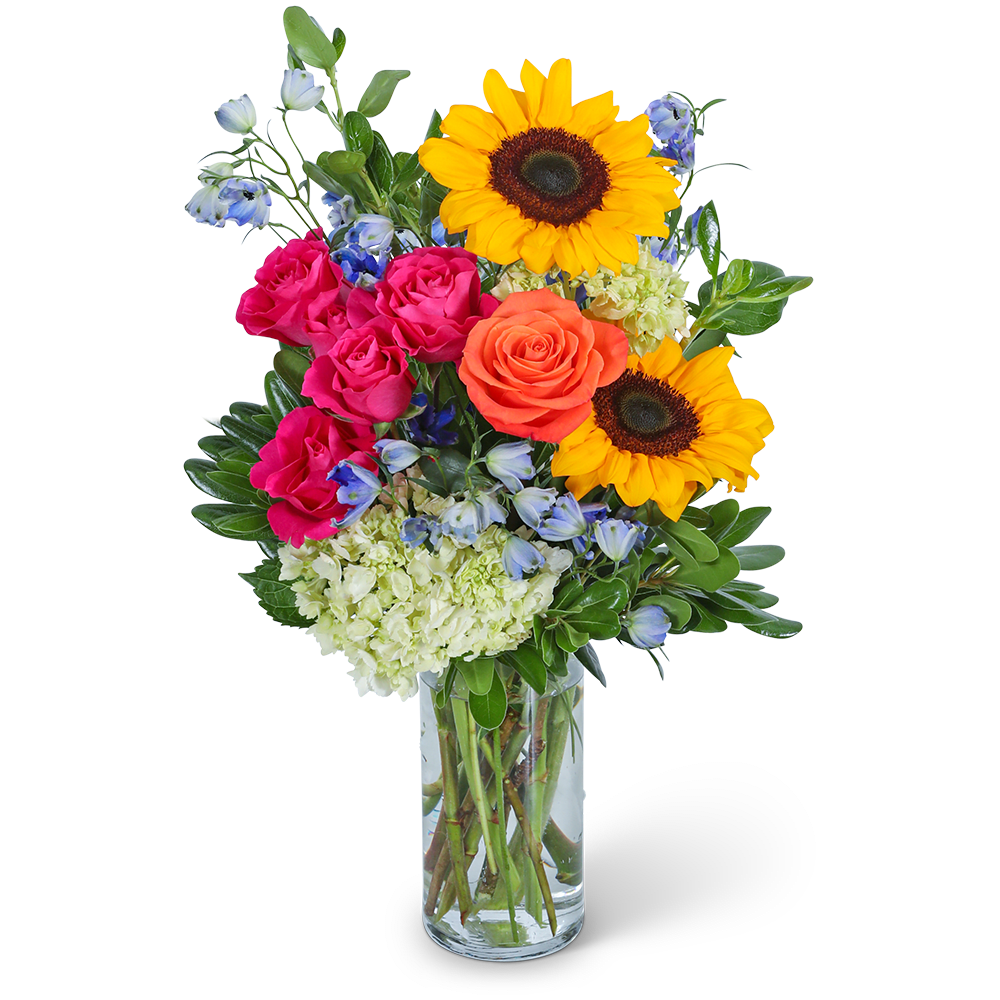 Bouquet of sunflowers, roses, and blue flowers in a glass vase