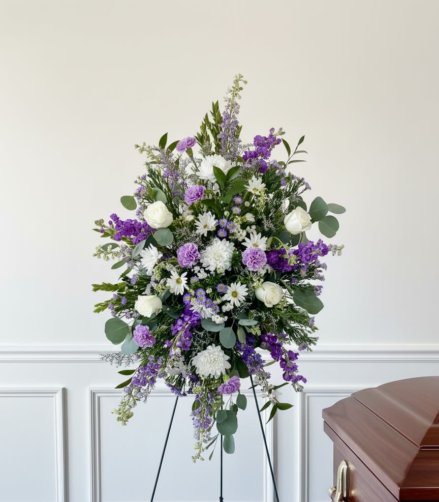Purple and white standing spray  - A tall soft and pretty standing spray. Filled with purple, lavender and white flowers. Measures 3ft tall by 2 feet wide. 