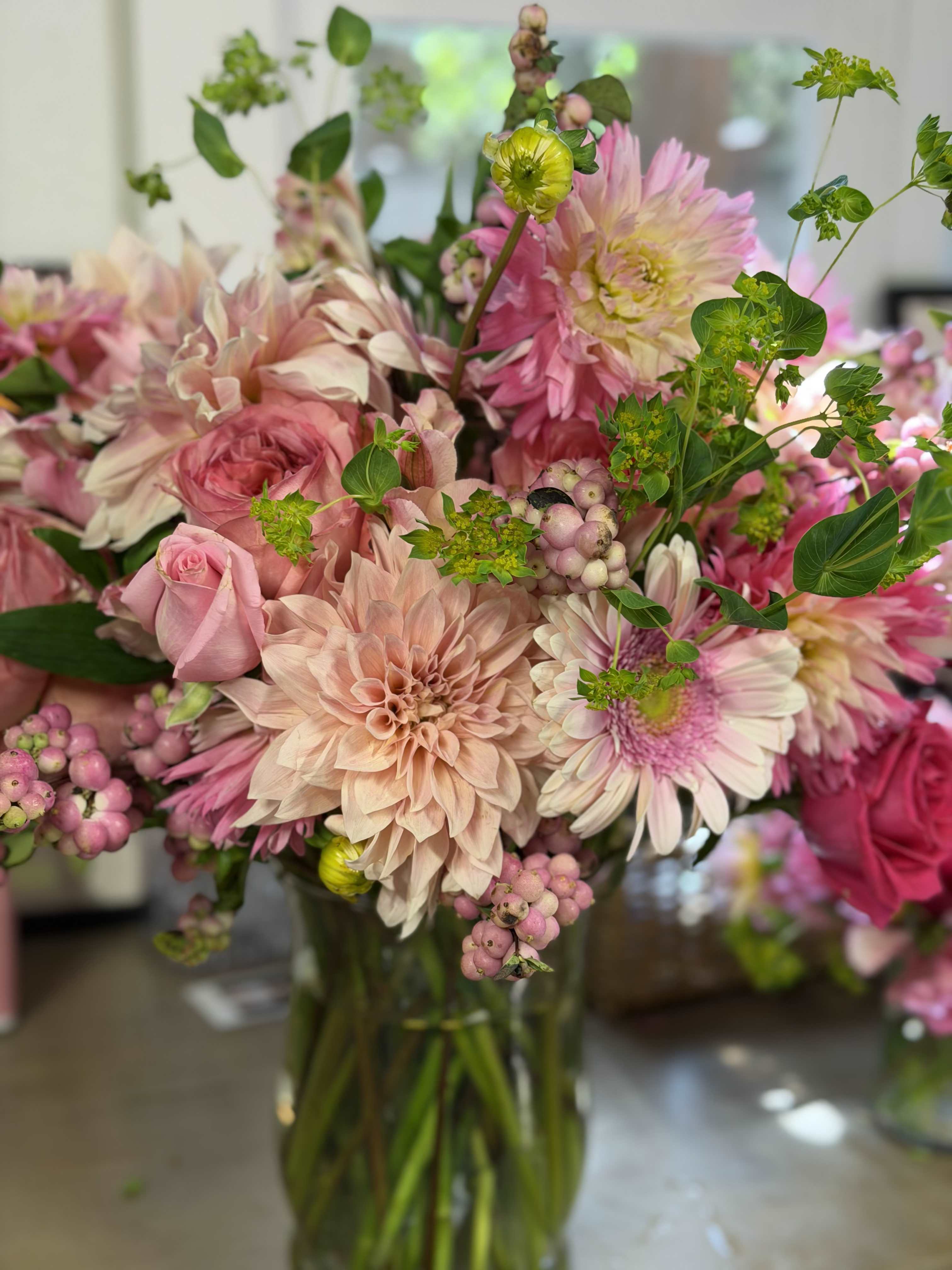Pink and blush mixed bouquet in a glass vase