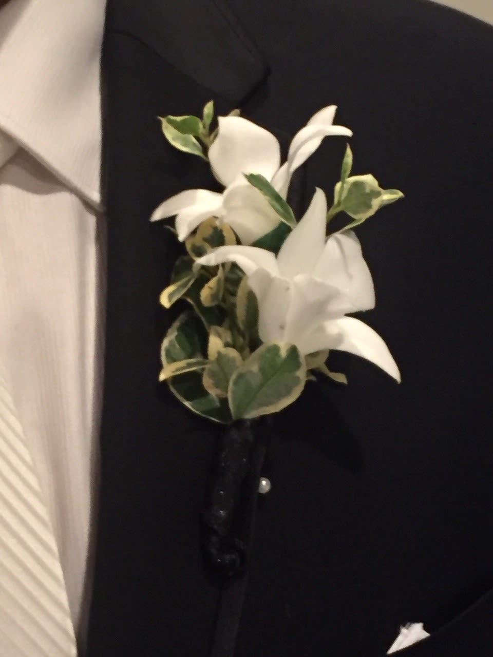 Dendrobium Orchid Boutonniere and Corsage - Recipe: Dendrobium Orchid corsage and/or boutonniere.  Dendrobium orchid colors available: white or pink  PLEASE READ BEFORE PURCHASE: Please provide a choice of color of flowers and ribbon in 'Special Instructions.' You can email photo of dress/ tux to our e-mail to match color ribbon to hello@flowerfinesse.com For boutonniere order regular, for deluxe order deluxe, for corsage and boutonniere set order premium. MUST BE ORDERED 2-3 DAYS IN ADVANCE.