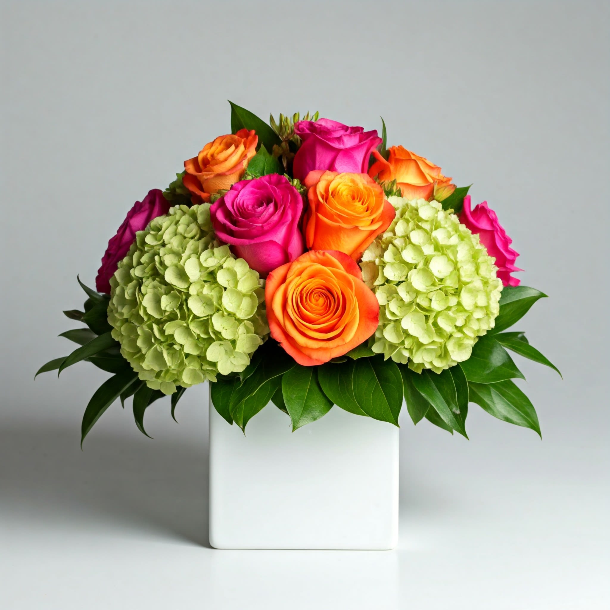 Va Va Bloom - Turn up the heat with the vivacious bouquet. This arrangement includes roses, carnations, stock, and hydrangea. This is the perfect gift for someone's birthday or any celebratory occasion.